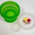Green-Cup-Water-Pills-White-Bkg